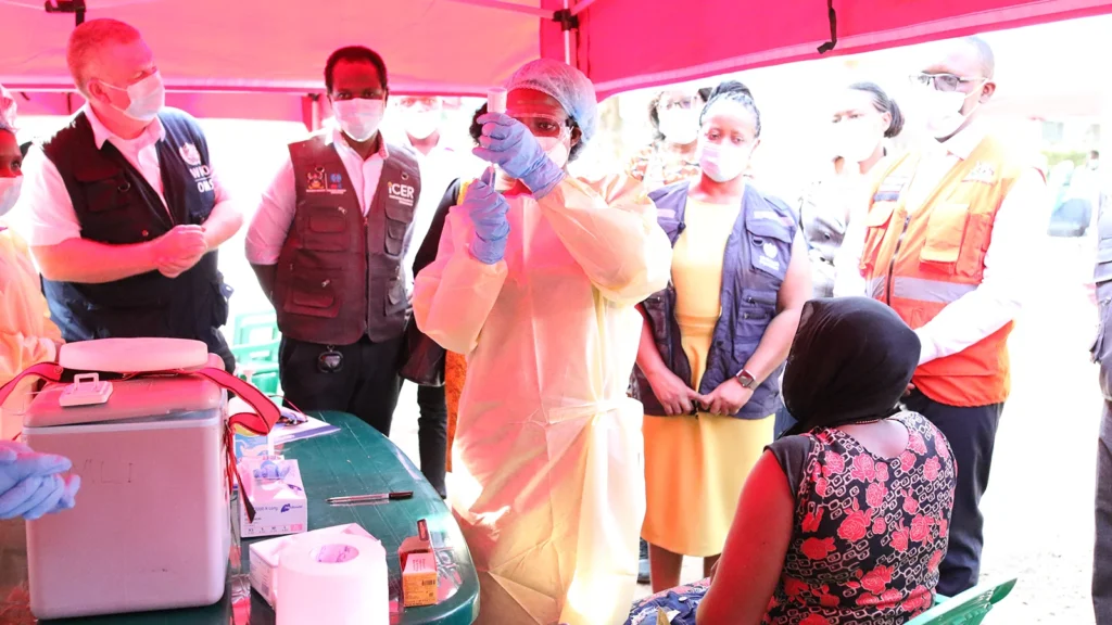 A health worker prepares to administer the first dose of IAVI's Sudan virus vaccine as part of a ring vaccination trial launched in response to an outbreak of Sudan virus disease in Uganda.